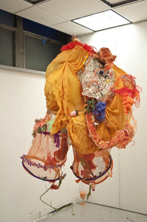 aimee hertog Installation and Sculpture Orange skirt, laundry baskets, lace, fake and real flowers, candy, loofah, plastic kitchen ware, yarn, pipe cleaners