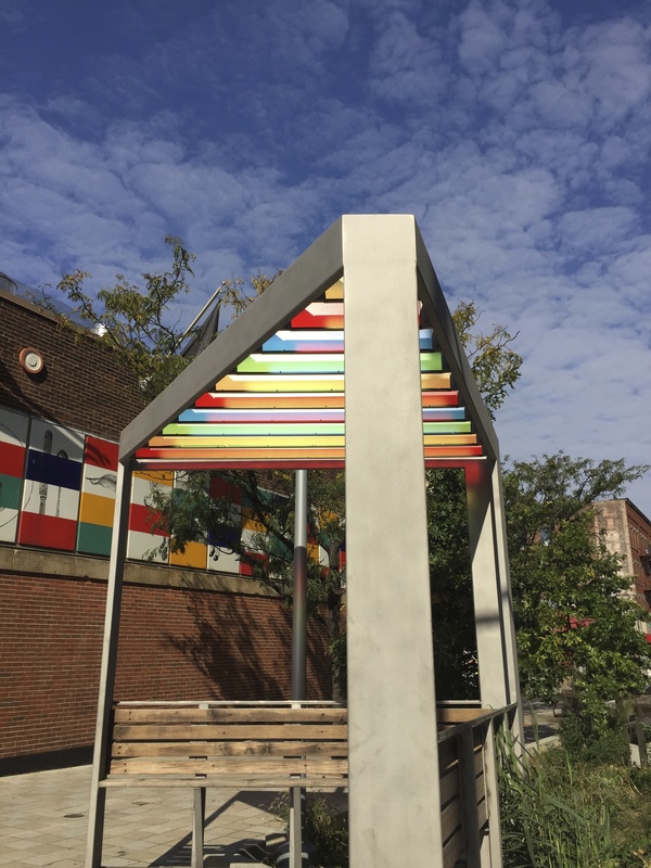 Plaza Perch Austin Thomas Works Stainless Steel with bead-blasted coating, reclaimed wood decking on the platforms, benches and seat backs, acrylic (3Form) paneled trellis and hardware.