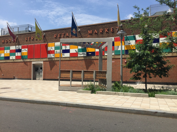 Plaza Perch Austin Thomas Works Stainless Steel with bead-blasted coating, reclaimed wood decking on the platforms, benches and seat backs, acrylic paneled roof trellis with sandstone finish in blue, red, yellow and green colors
