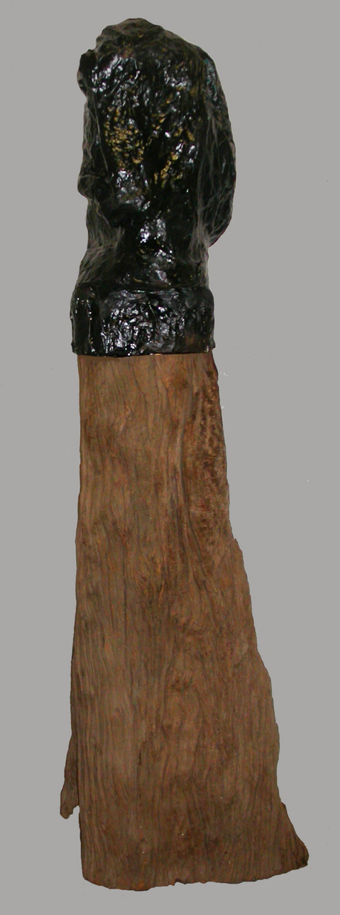 Black Head on yellow base Carol Bruns Figures styrofoam, paper, plaster, paint