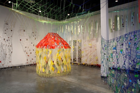 Caroline Lathan-Stiefel  Layer City (2009) fabric, pipe cleaners, plastic, yarn, thread, rice bags, pins, fruit nets, newspaper, straws, lead weights, mirrors