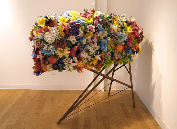 Iron Flowers-Everything I Don't Know Charles Goss Everything I Don't Know discarded cemetery artificial flowers, ironing board