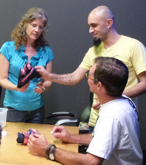 The aritst coaching 2 Makers at Gangplank, Chandler Maker Party. Push Down & Tango