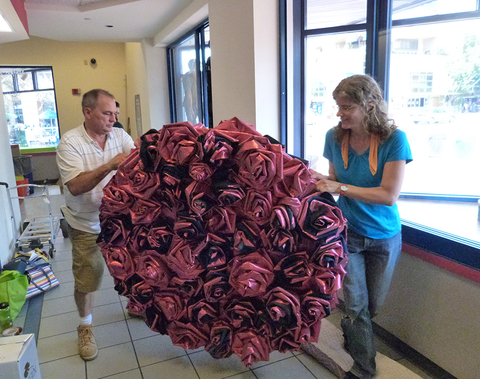 Carrying the Rose Cluster on installation day Push Down & Tango