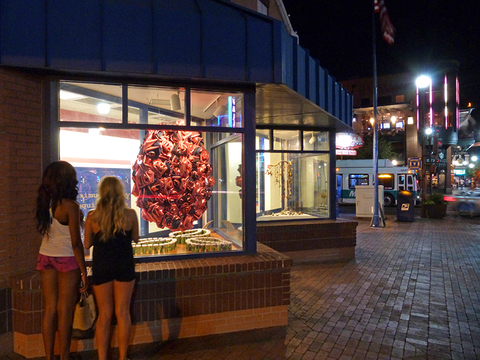 Pedestrians on downtown Mill Avenue enjoy PUSH DOWN & TANGO. Push Down & Tango