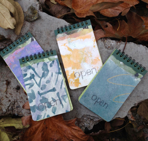 Weatherproof notebooks wore collaged covers Poetry of the Spheres