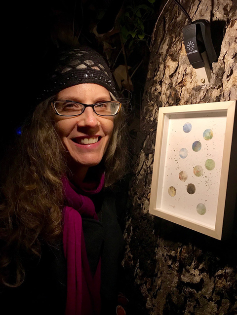 Crystal Daigle, the artist, within Poetry of the Spheres Poetry of the Spheres