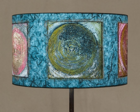 EarthSong (carnival) Belfast Bay Shade Company: Handcrafted Lampshades Collagraph hand-printed on archival paper and fused to styrene on steel shade rings