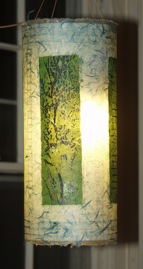 tree on blue Luminaires collagraphs on kozo wrapping steel armature