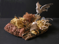 Gilda Pervin  Sculpture Feathered bird form, burlap, Portland cement, acrylic medium and acrylic paint, sponges, quail egg shells, stones, brass pot scrubbers, other found objects  