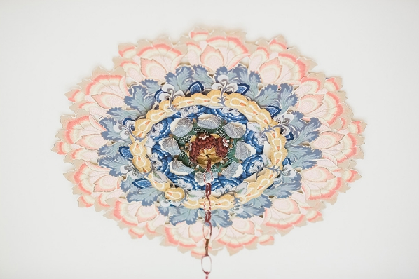 Ceiling rose medallion from the exhibition 'Keeping Up Appearances' Jane Deering Gallery Elizabeth Alexander Wallpaper, found objects, sound, adhesive wood