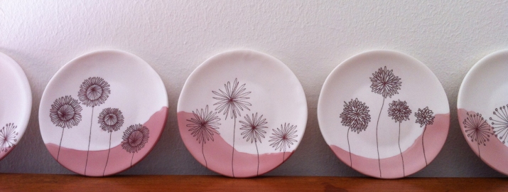 Native Landscape (detail) . Eleven porcelain plates on handcrafted fir plate rail Jane Deering Gallery Exhibition: Ceramics . 'A Thousand Hours' Porcelain, soluble salts, wood
