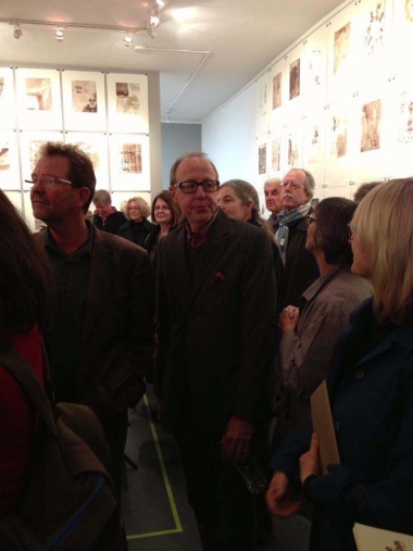 artist Keith Puccinelli and crowd at the opening reception Jane Deering Gallery Dane Goodman + Keith Puccinelli
