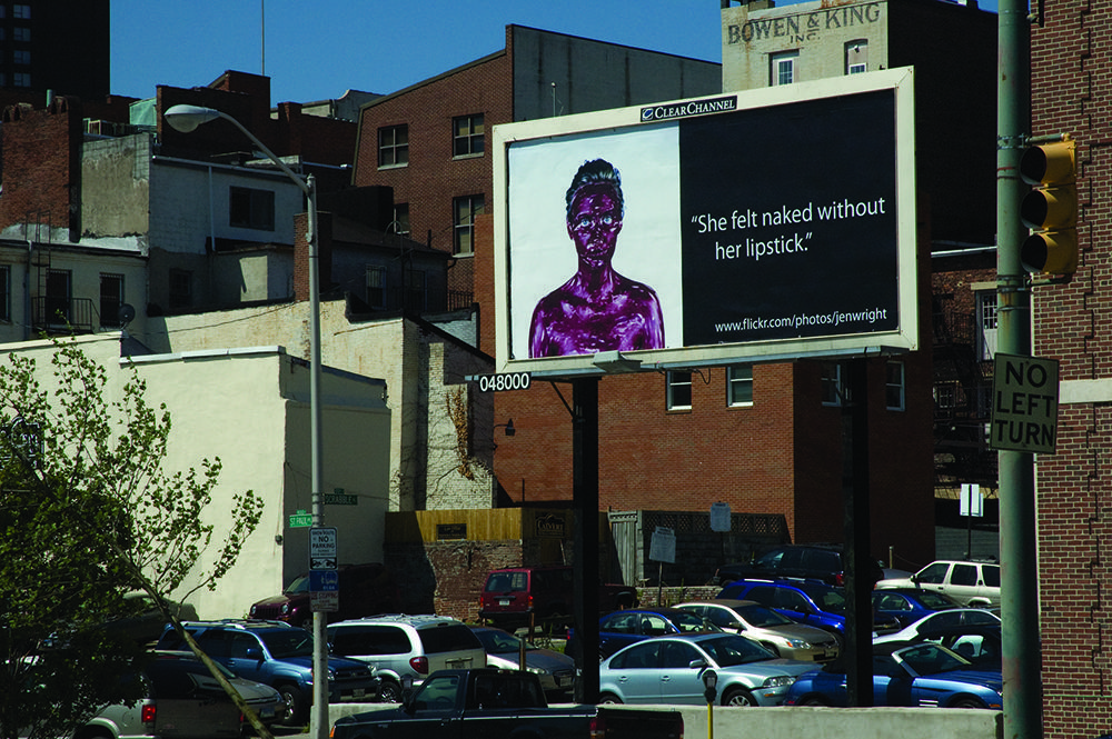 "She felt naked without her lipstick." Jennifer Leigh Wright Song Feminist Artwork Installed Billboard
