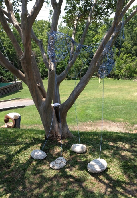 Air Writer s i t e specific woven wisteria vine, cotton & river rocks