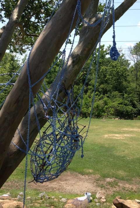 Air Writer s i t e specific woven wisteria, cotton & river rocks