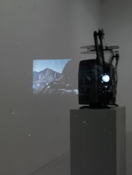 Sundial/Substrate/Scene (Detail) Marc Handelman Geological Sketches at Home and Abroad Glass, oil paint, 16mm projector with looper, color 16mm film (2 min), pedestal and hardware
