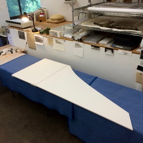 The lid, coated in milk paint, arrives at the studio harpsichord decoration for Middlesex School