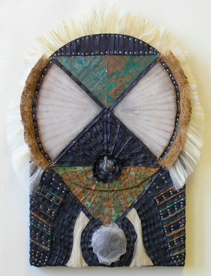 Digging Deep: Becoming Invisible Constructions Recycled rubber, patinated metal, tacks, synthetic hair, tulle, recycled nipple on two joined panels