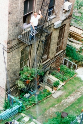 The community garden was my introduction to New Yorkers, when moving to the city in 1996. Here: fire-escape waves from neighbor, Fred, watering garden below. Anna Lise Jensen A Lot, NY community gardens, 2009-2013