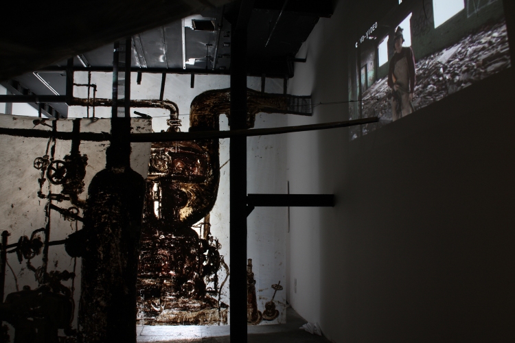 Cindy Tower Happenings/Performed Sculpture Video Installation with projected factory inhabitants.