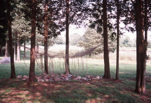Marcia Cooper BETWEEN the Trees Mixed media installation with ropes, netting,stones, pottery