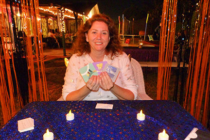 Hostess enjoying her Halloween Birthday Oracle Party Psychic Services