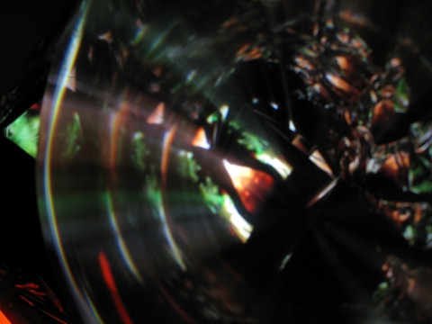 Daniel Healey video sculpture t.v. monitor, stool, mirrors, fresnel lens, mylar, tape, cardboard, light, video