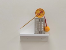 Emilie Lemakis Lie With Me and Watch the Stars Die tin can, jar lid, chopstick, yarn, wood 