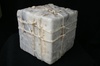   Dimensional Works Beeswax and resin, cardboard box wrapped in plaster cloth, jute cord