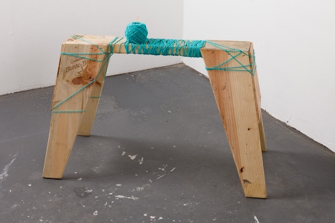 jane hugentober 2012 third trimester wooden sawhorse, ink, yarn, and tapestry needle
