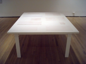  The Drawing Center, NY 2009 Cloth, tea, dirt, ironing, on painted wood table