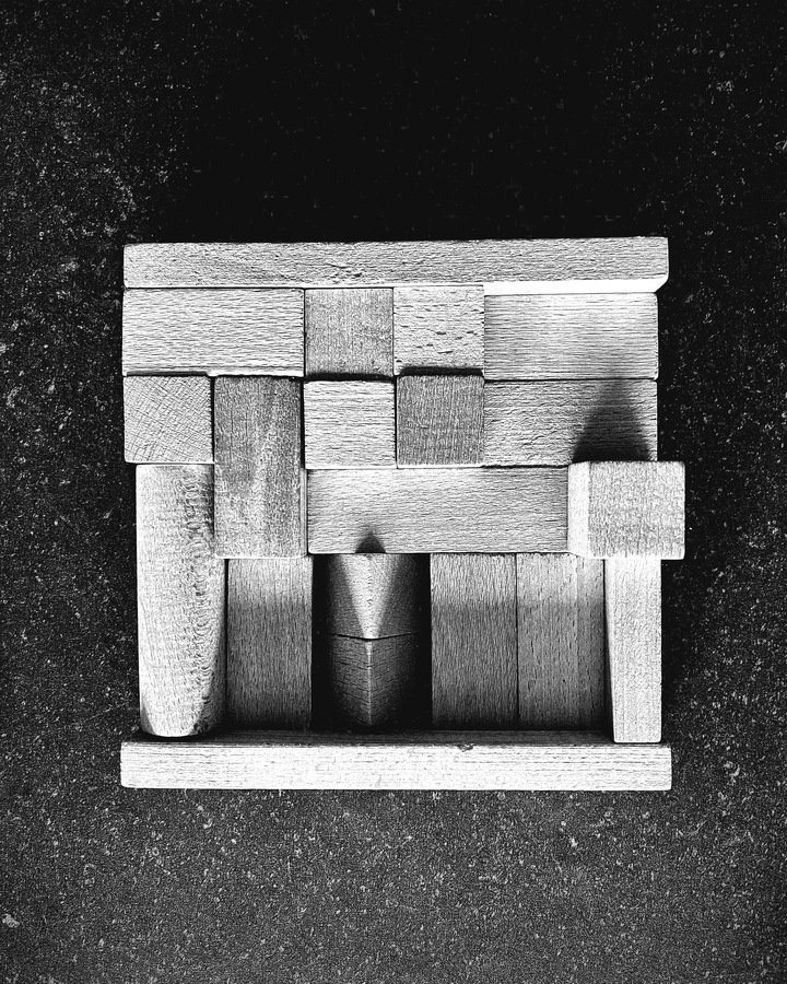 Kenneth Jaworski Constructions | Wood | 2024 Hand-sanded oak blocks placed over oak | Displayed on Belgian Hardstone Tile | Photographed in B/W