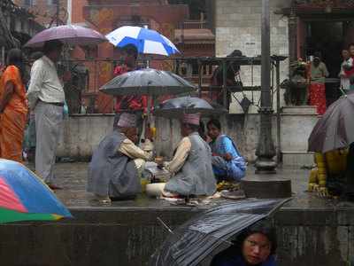 L.A. Photo Curator: Global Photography Awards - 'Where Photography & Philanthropy Meet' FIRST PLACE: Mykel Rose - Rain A drizzle of rain doesn't disrupt life in Kathmandu