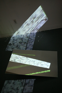 Michelle Anne Holman Visual Snow Storm // Installations Video projection, mirrors, glass shelves