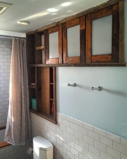 Bathroom remodel: cabinets - reclaimed southern pine with rice paper lucite panels