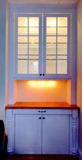 China cabinet with lights, pocket door storage below for work area