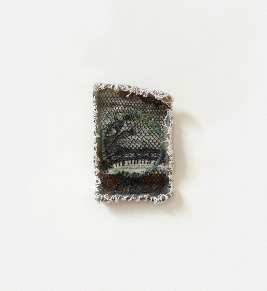 Nicola Ginzel  Archive/ Selected Transformed Objects  boarding pass, graphite, wax, thread, lace
