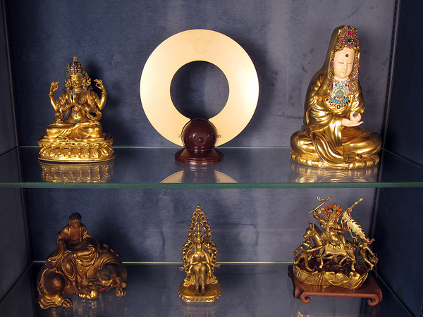  All is Always Now 1950's TV antenna flanked by ancient Buddhas.