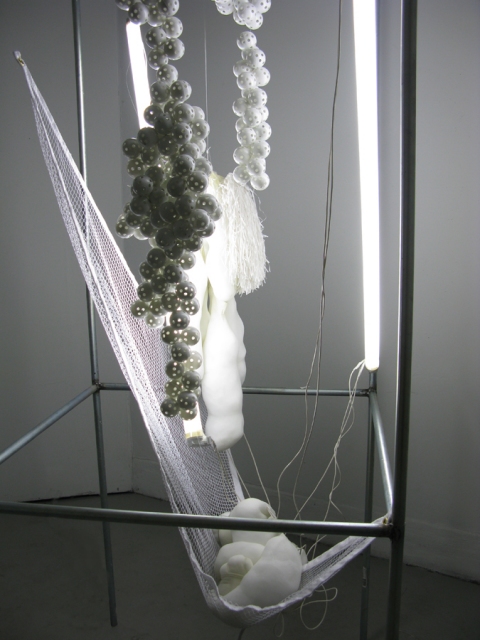 Petra Groen Sculpture/ installations mixed media,  fluoresced light, golf balls, nylon stockings