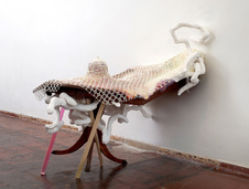 Rebecca Ripple work  wood table, bobbin lace, plaster, paint, acrylic, sculpt-a-mold, graphite