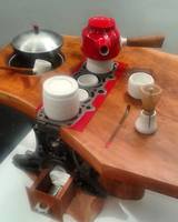 Sean Naftel Celica Tea Ceremony: Calder Brannock Porcelain, epoxy resin, cherry wood, engine block, matcha, bamboo, rag, stainless steal pot