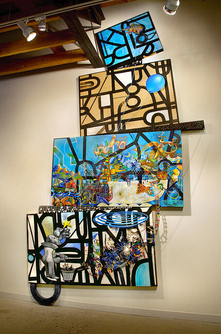 Shawn Turung                            multi media fine art Totems / 3-D Murals latex house paint, Sumi ink, and wedged wood contruction