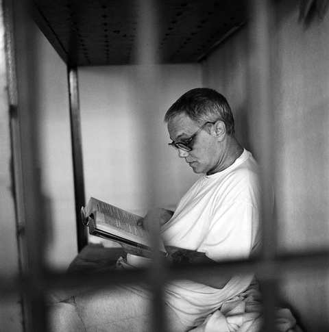 Don Jordan reading his Bible, main prison 