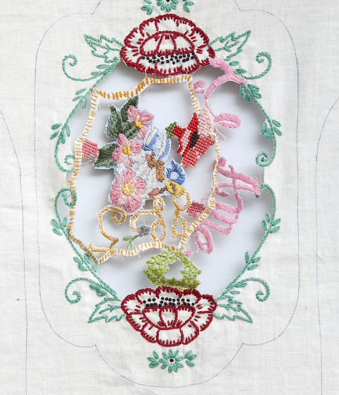 Venetia Dale piecing together collected and stitched together unfinished embroidery